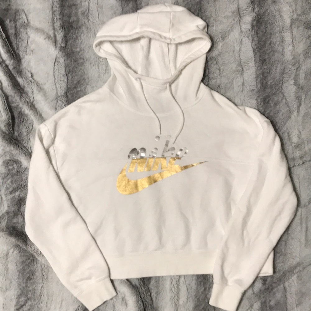 Nike womens size medium cropped hoodie with silver and gold Nike swoosh.